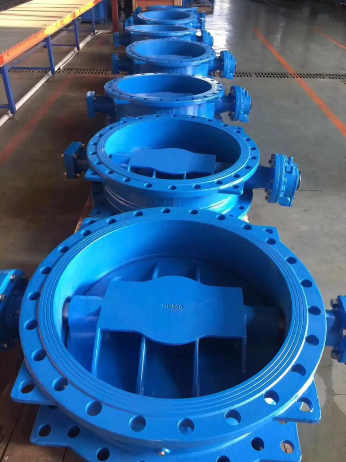 rows of open blue butterfly valves